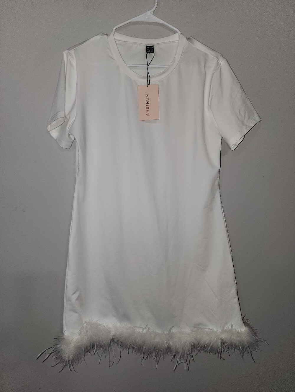 White Dress With Feather Hem Size Large
